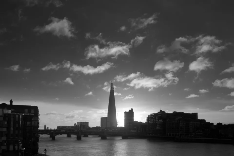 Backlit clouds above early morning view of the Thames