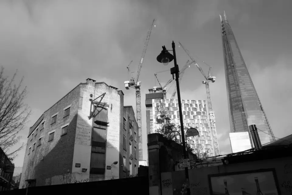 Old warehouse and street furniture in front of building site near the Shard